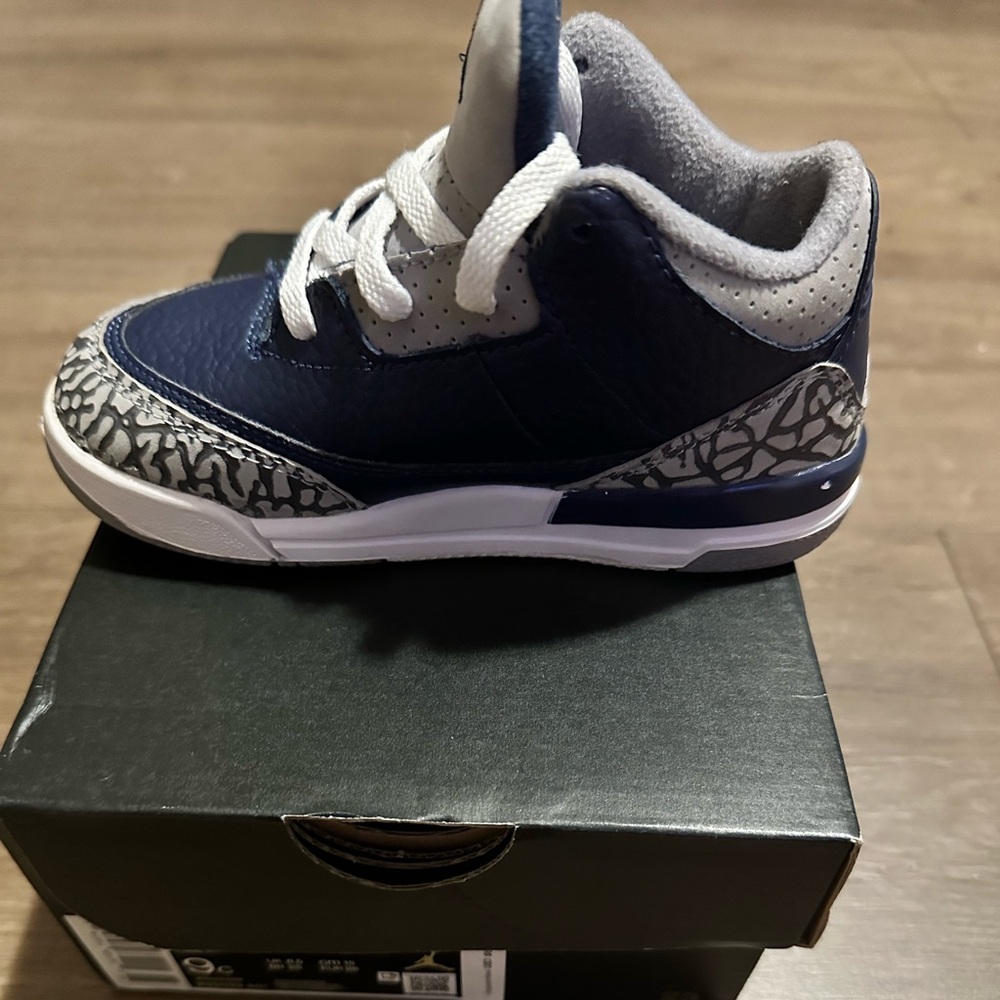 Blue and Gray Sneakers with Iconic Elephant Print